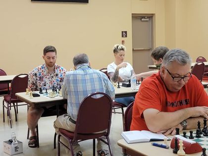 People playing chess at the monroe chess club